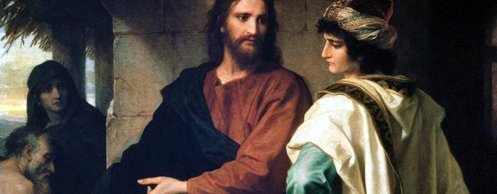 A person and person sitting on a couch